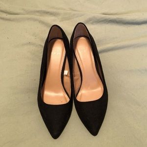 Low black pointed toe heels